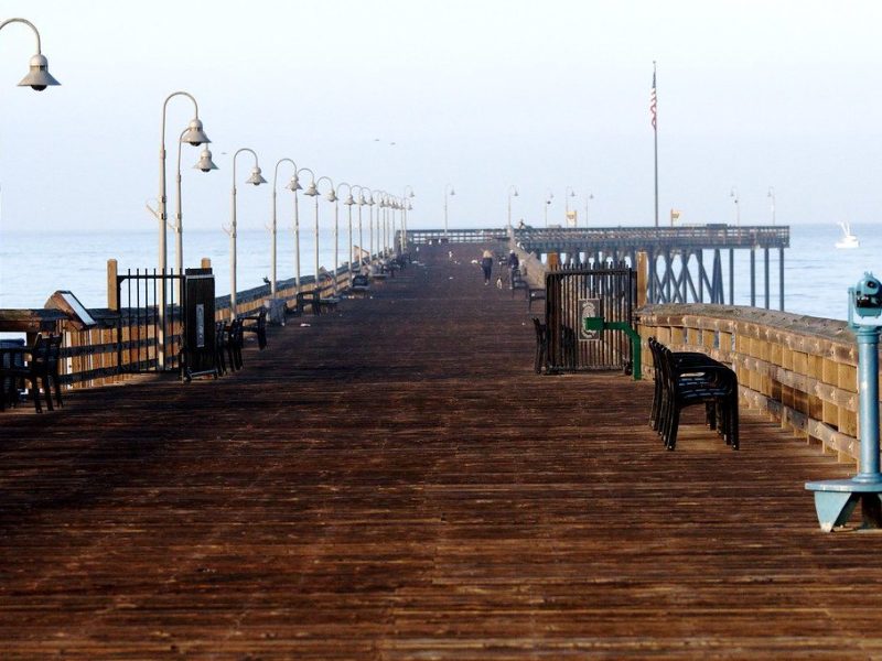 The wooden jetty at the mouth of the cove