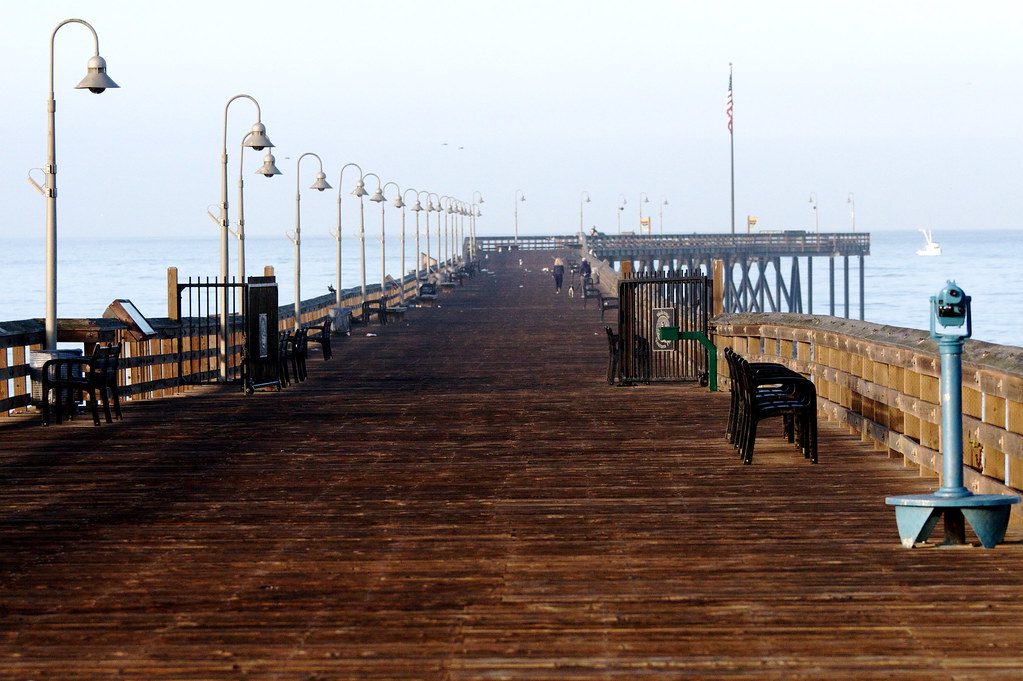 The wooden jetty at the mouth of the cove