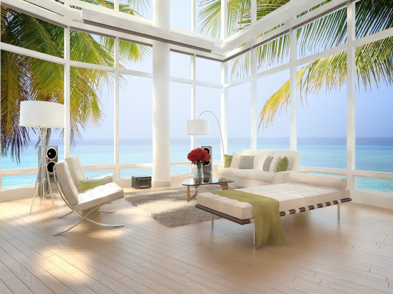 Cove View Loft with a double-height window over the water