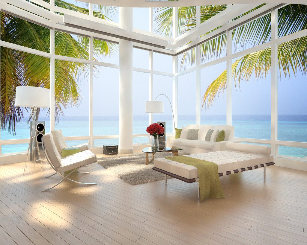 Cove View Loft with a double-height window over the water